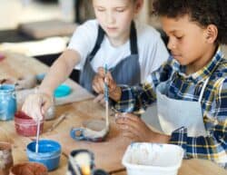 Girl & Boy Painting pottery